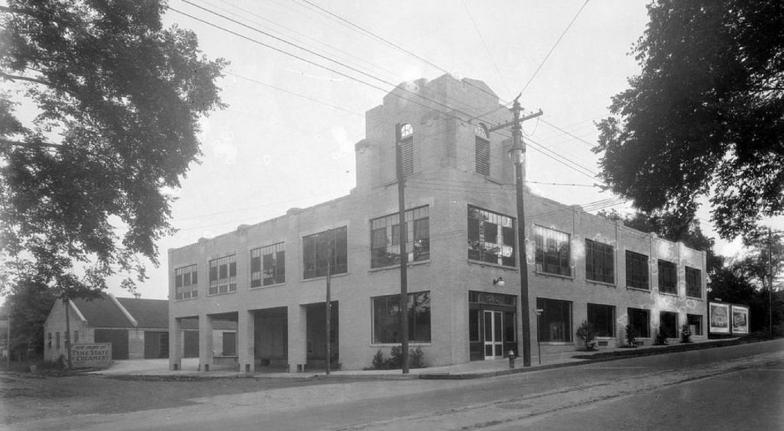 Old photo of historic Raleigh, showing the original Creamery building